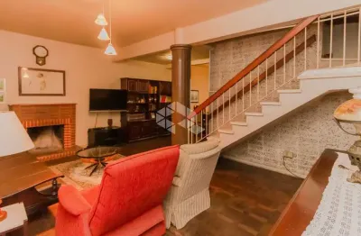 Casa com 4 quartos à venda na Rua Sinimbú, 162, Petrópolis, Porto Alegre