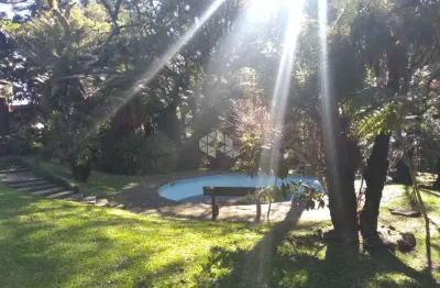 Área 5.550m2 de terreno em canela. casa com 6 dormitórios, suite, area de lazer.