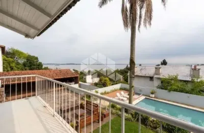 Casa em condomínio fechado com 5 quartos à venda na Rua Simão Bolívar, 341, Vila Conceição, Porto Alegre