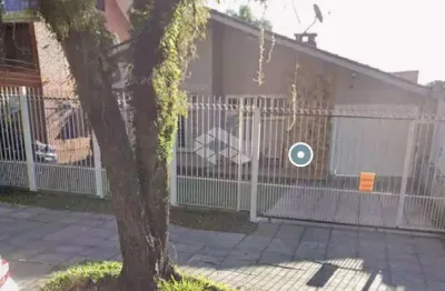 Casa com 4 quartos à venda na Rua Estácio de Sá, 700, Chácara das Pedras, Porto Alegre