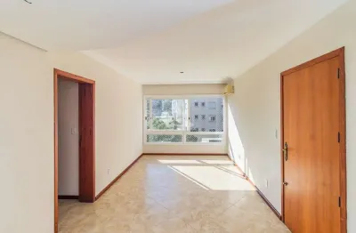 Apartamento á venda com 2 dormitórios e 1 vaga coberta no bairro Auxiliadora