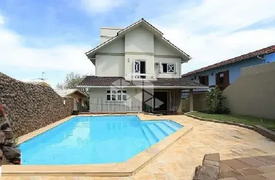 Casa 4 dormitórios, piscina no bairro  primavera em novo hamburgo