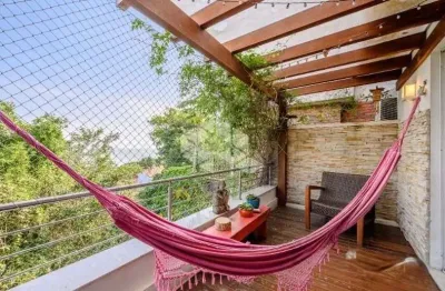 Casa com 4 quartos à venda na Rua Goitacaz, 333, Vila Assunção, Porto Alegre
