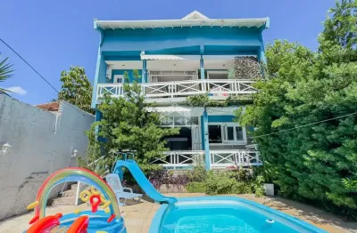 Casa com 3 quartos à venda na Rua Itapema, 156, Vila Jardim, Porto Alegre
