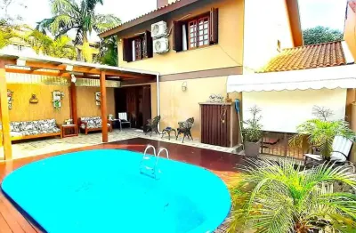 Casa com 4 quartos à venda na Rua Ari Peixoto Martins, 190, Espírito Santo, Porto Alegre