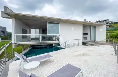 Casa de alto padrão, com 4 dormitórios, sendo 4 suítes, no condomínio alphaville em porto alegre