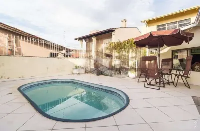 Casa 3 dormitórios 184 m2, suíte master, 4 banheiros, piscina a 100 metros zaffari cavalhada