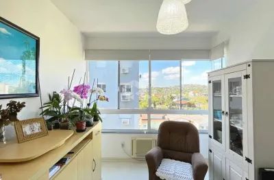 Apartamento 2 dormitórios andar alto, elevador, vista livre, vaga coberta, no bairro cristal