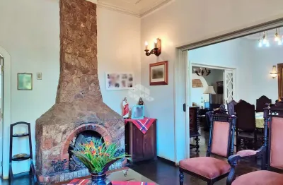 Casa com 6 quartos à venda na Rua Santa Cecília, 2186, Santa Cecília, Porto Alegre