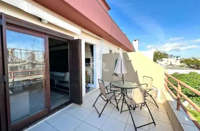 Cobertura 2 dormitórios, sendo uma suíte, 1 vaga de garagem coberta e escriturada  no bairro jardim botânico.