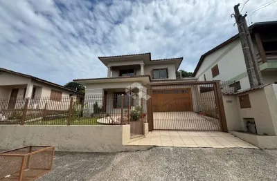 Casa com 3 dormitórios, sendo 1 suite, no bairro arroio grande