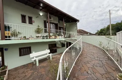 Casa em terreno comercial no bairro ana nery/arroio grande