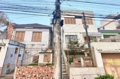 Terreno com casa e 02 apartamentos a venda no bairro centro