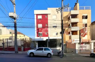 Vende-se apartamento térreo com amplo terraço e garagem - próximo à universidade franciscana (ufn)