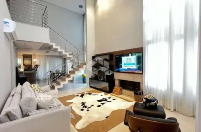 Casa residencial alto padrão à venda com 4  quartos sendo 1 suíte master e 4 vagas garagem no bairro pedra branca em palhoça/sc.
