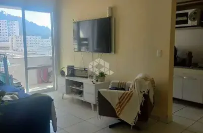 Apartamento no bairro areias, em são josé, sc, sacada, churrasqueira, 02 dormitórios sendo 01 suíte, 01 vaga de garagem.