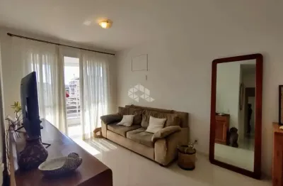 Apartamento no bairro coqueiros, em florianópolis, sc, semi-mobiliado, sacada, churrasqueira, 03 quartos sendo 01 suíte, 02 vagas de garagem.