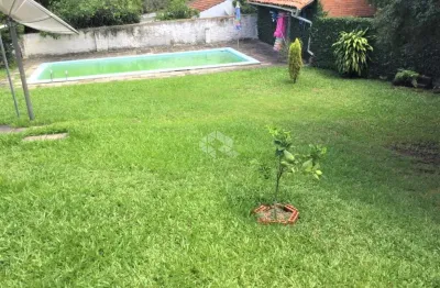 Tristeza - terreno com casa de 04 dorm. piscina e garagens. ótimo para construir.