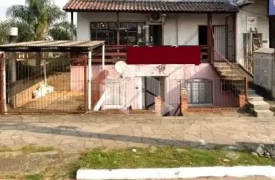 Prédio residencial e comercial 1 casa, 4 apartamentos e 2 lojas.