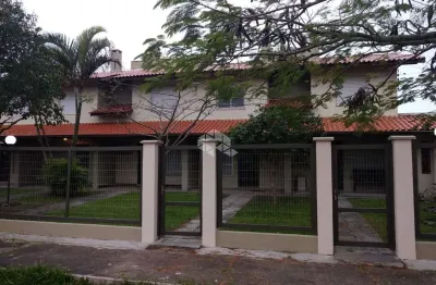 Sobrado em condomínio com 4 dormitórios e 1 vaga em capão novo