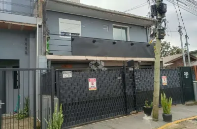 Casa com 3 quartos à venda na Travessa Escobar, 215, Camaquã, Porto Alegre