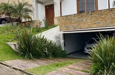 Casa em condomínio fechado com 3 quartos à venda na Avenida Senador Salgado Filho, 8500, Jardim Krahe, Viamão