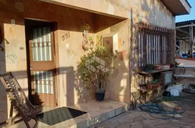 Casa com 4 quartos à venda na Rua Doutor João Inácio, 227, Sumaré, Alvorada
