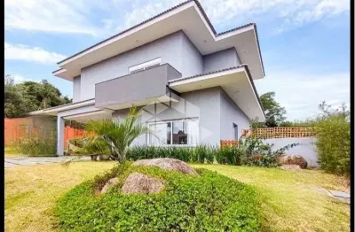 Casa com 3 quartos à venda na Estrada das Três Meninas, 222, Vila Nova, Porto Alegre