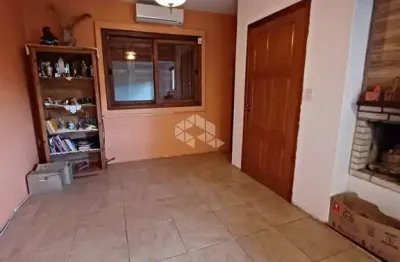 Casa com 3 quartos à venda na Estrada João Passuelo, 1100, Vila Nova, Porto Alegre