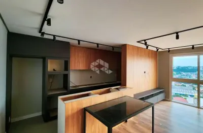 Apartamento com marcenaria completa, com 51m², 2 dormitório, 1 banheiro e uma vaga de garagem, ótima psoição solar