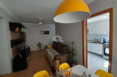 Dois dormitórios com suíte, churrasqueira, vaga coberta e vista livre