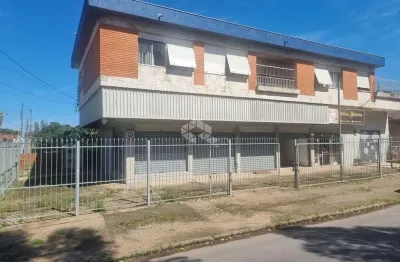 Excelente prédio com amplo apartamento com 3 dormitórios, suíte no segundo andar com garagem e 3 lojas grandes no térreo em avenida no bairro sarandi