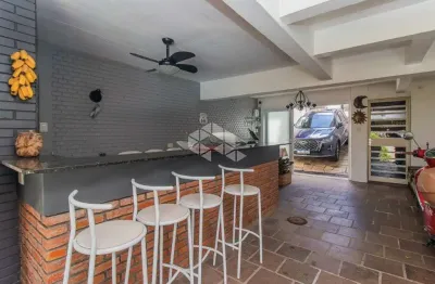 Casa com 3 quartos à venda na Rua Carlos Huber, 91, Três Figueiras, Porto Alegre