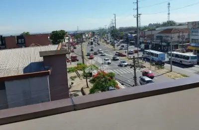 Prédio comercial de esquina no bairro Sarandi com 531m² construídos