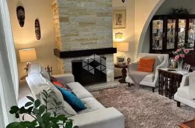 Casa com 3 quartos à venda na Avenida Coronel Gastão Haslocher Mazeron, 260, Medianeira, Porto Alegre