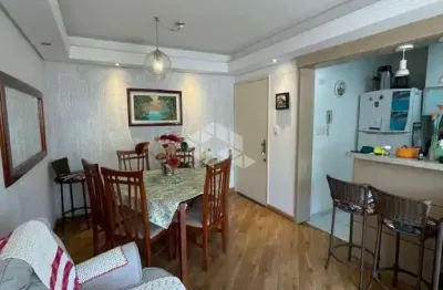 Apartamento de dois dormitórios e duas vagas no menino deus