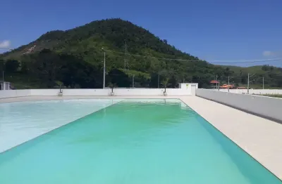 Terreno em condomínio fechado com portaria 24 horas e lazer completo no caxito  em maricá