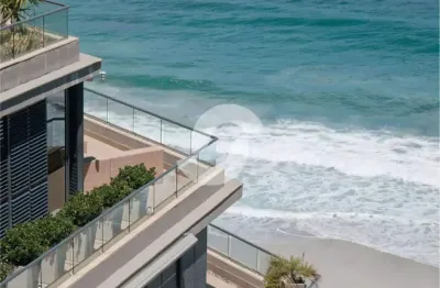 Apartamento frente mar com 4 suíte e 3 vagas de garagem em camboinhas