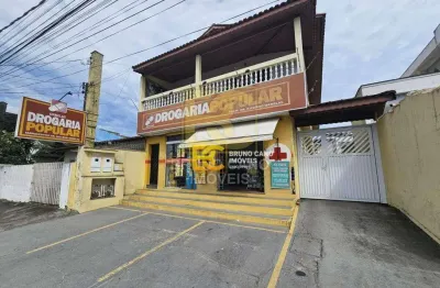 Casa com 3 dormitórios à venda, 403 m² por r$ 1.500.000,00 - centro - peruíbe/sp