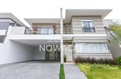 Casa em condominio com 4 suites e 4 vagas em santa felicidade