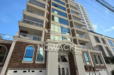 Apartamento novo 3 suítes e 2 vagas no centro de itapema
