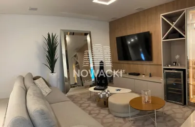 Espetacular apartamento mobiliado com 4 suítes e 3 vagas na praia brava!