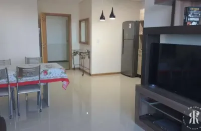 Apartamento com 02 dormitórios e terraço no coração do centro de tramandaí/rs.