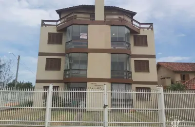 Apartamento duplex com 2 dormitórios, sendo 1 suíte próximo a praia em tramandaí