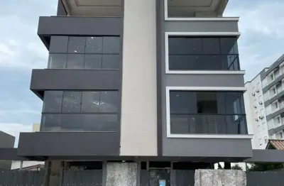 Apartamento mobiliado e decorado 2 dormitórios no centro de tramandaí.