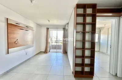 Apartamento 02 dormitórios (01 sendo suíte), sacada com churrasqueira próximo a