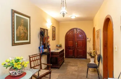 Lindo sobrado com  piscina, 4 suítes, 4  vagas de garagem