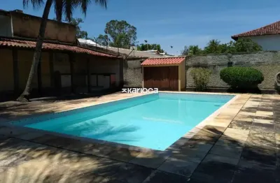 Jacarepaguá freguesia casa linear 768m² terreno 364m² de área construída 4 quartos 3 suítes amplo quintal com piscina e área gourmet.