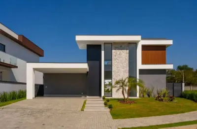 Casa à venda com 3 quartos, sendo 3 suítes, no condomínio portal dos bandeirantes, salto - sp