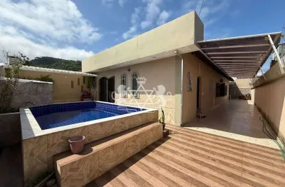 Casa à venda na praia de massaguaçu, com 03 suítes , área gourmet completa com churrasqueira e pisc